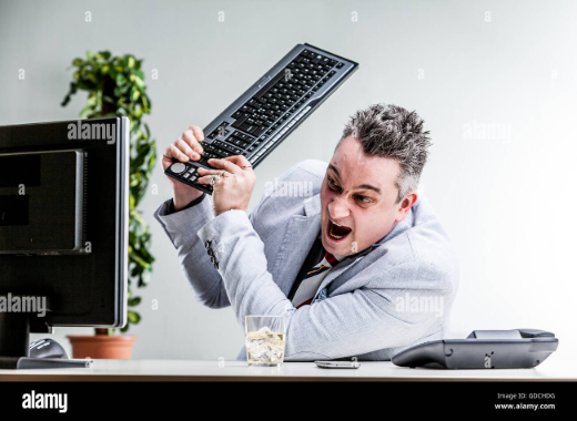 Guy smashing keyboard